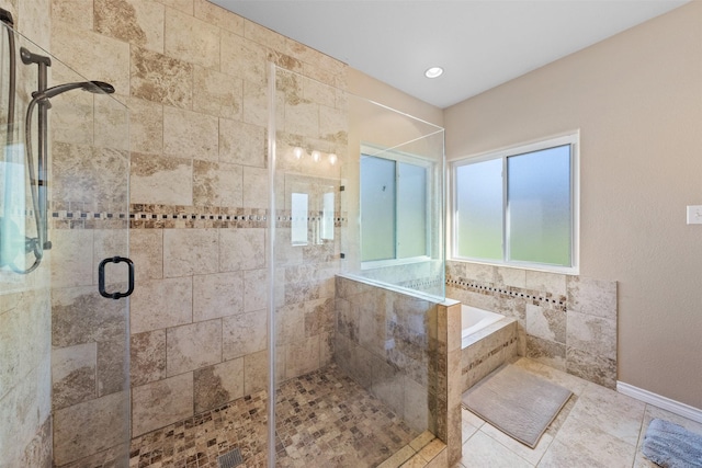 bathroom with plus walk in shower and tile patterned floors