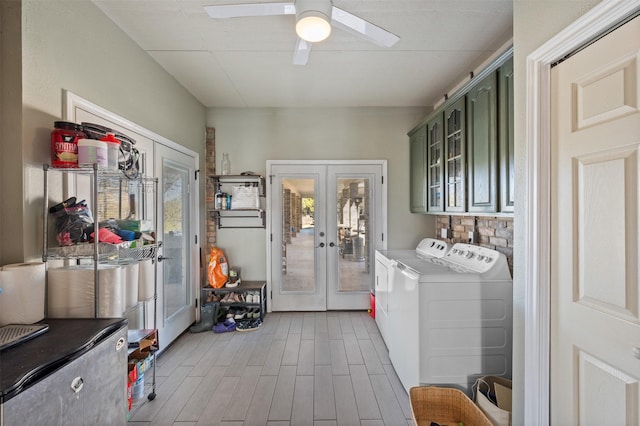 clothes washing area with washer and dryer, ceiling fan, cabinets, and french doors