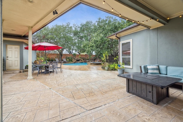 view of patio / terrace with an outdoor hangout area and a fenced in pool