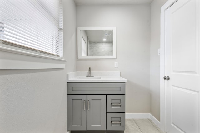 bathroom with vanity and tile patterned floors