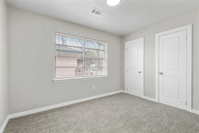 unfurnished bedroom featuring carpet flooring