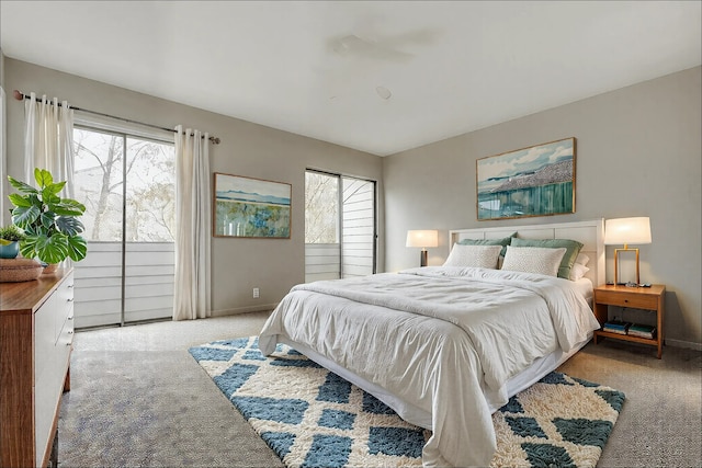 bedroom featuring light carpet, access to exterior, and baseboards