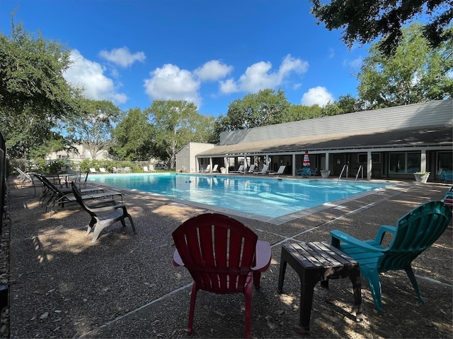 pool featuring a patio area