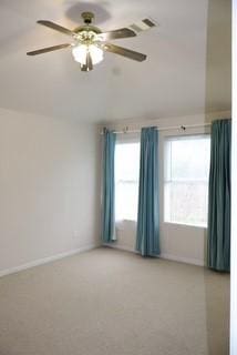 empty room featuring ceiling fan