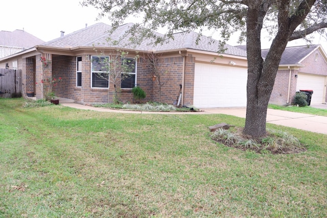 single story home featuring a garage and a front lawn