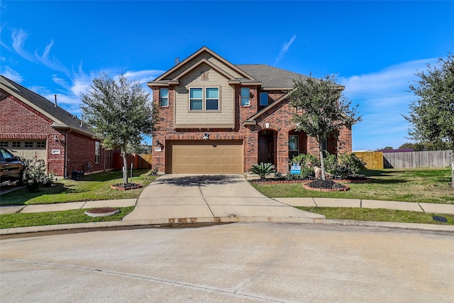 view of front of home featuring a front yard and a garage