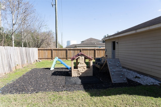 view of yard with central AC