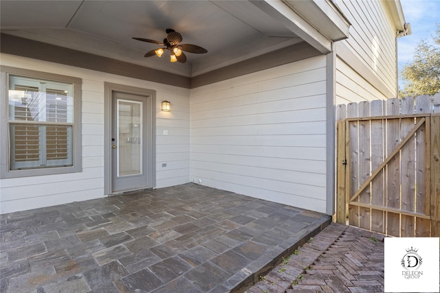 view of patio featuring ceiling fan