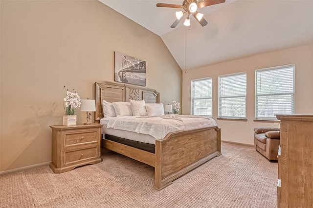 carpeted bedroom featuring ceiling fan and lofted ceiling