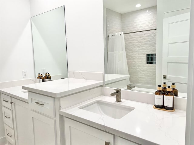 bathroom with shower / bath combination with curtain and vanity