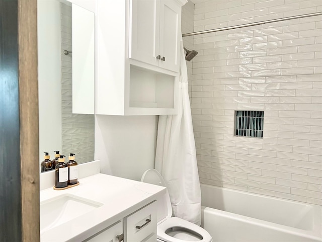 full bathroom featuring toilet, vanity, and shower / tub combo with curtain