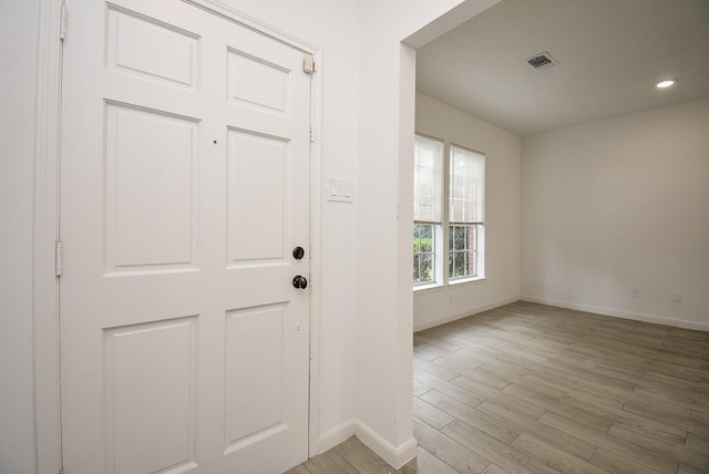 entrance foyer with light hardwood / wood-style floors