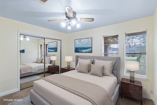 bedroom featuring a closet, carpet, and ceiling fan