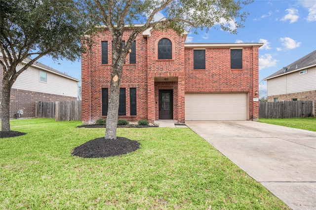 view of property with a garage and a front yard