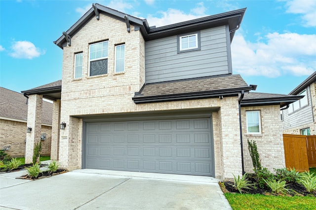 view of front of property featuring a garage