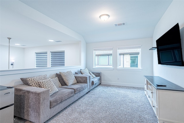 living room featuring light carpet