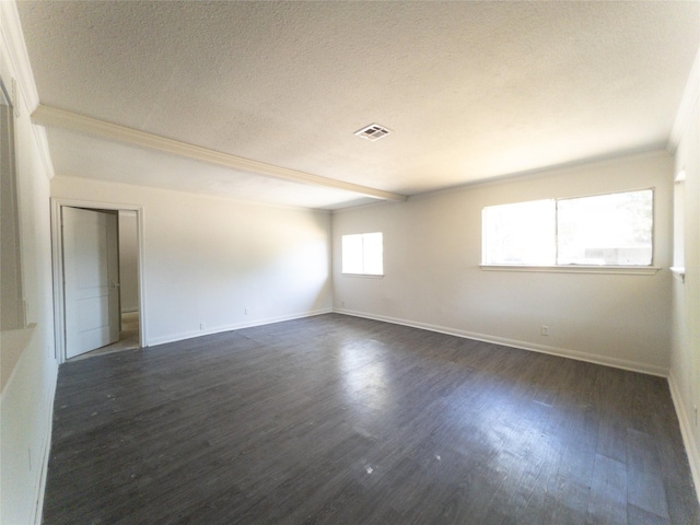 unfurnished room featuring a textured ceiling and dark hardwood / wood-style flooring