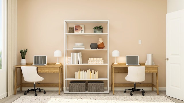 home office featuring hardwood / wood-style floors