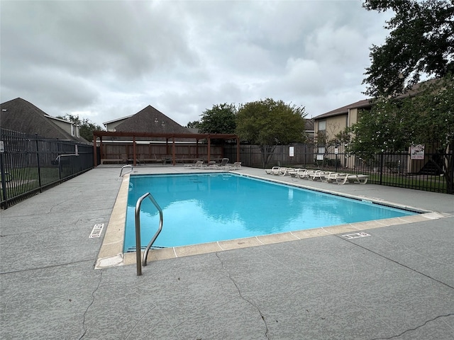 view of swimming pool featuring a gazebo and a patio