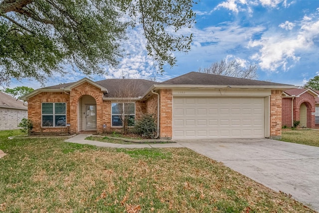 ranch-style home with a garage and a front lawn