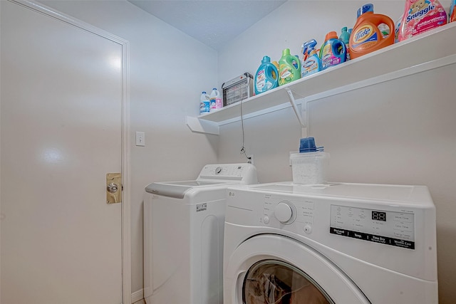 laundry area featuring independent washer and dryer