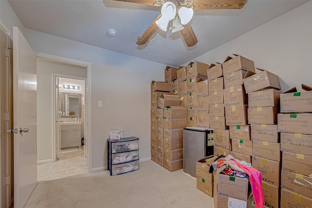 storage room featuring ceiling fan