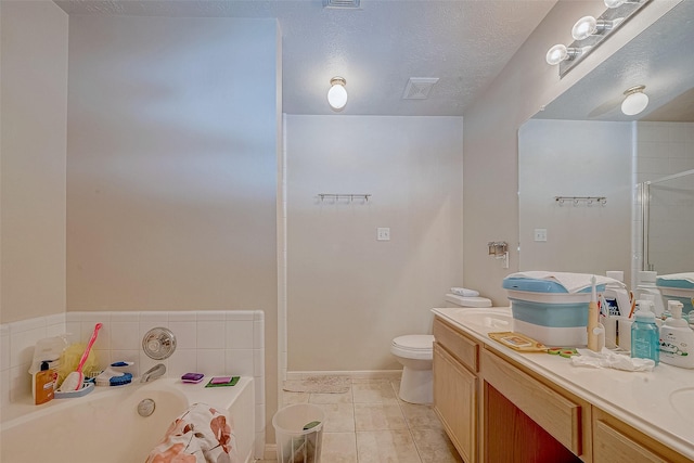 full bathroom featuring a textured ceiling, tile patterned flooring, vanity, toilet, and independent shower and bath