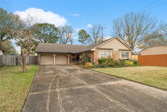 single story home featuring a garage and a front yard