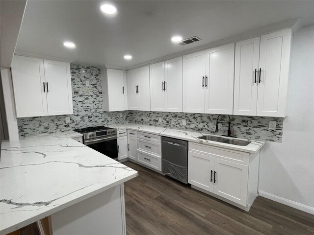 kitchen with white cabinetry, stainless steel range, dishwasher, light stone counters, and sink