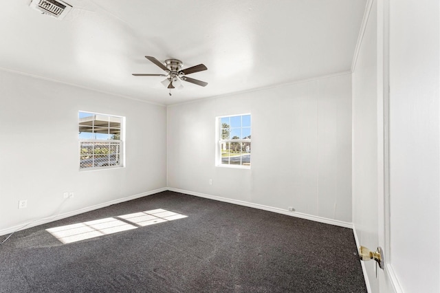 unfurnished room with ceiling fan, crown molding, and carpet floors