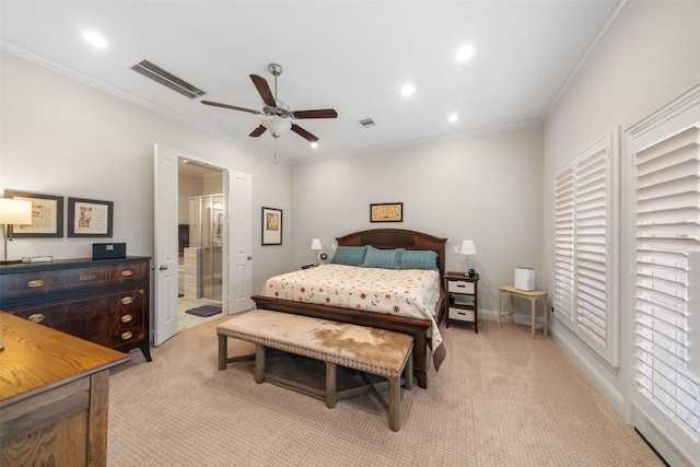 bedroom with ensuite bathroom, crown molding, light carpet, and ceiling fan