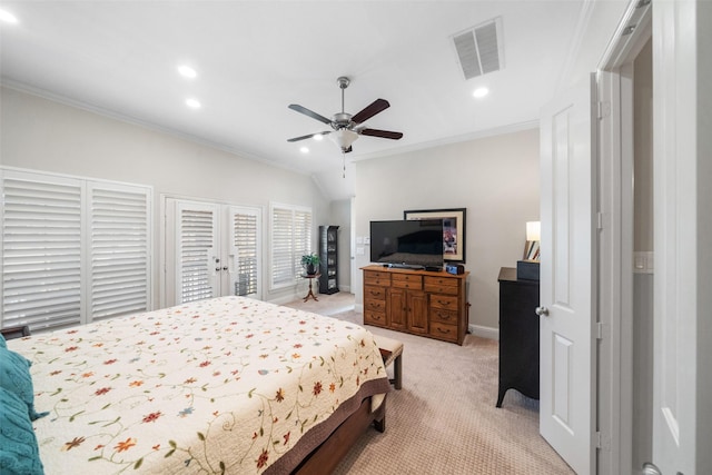 carpeted bedroom with ornamental molding, ceiling fan, and french doors