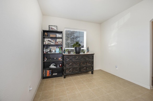 living area with light tile patterned flooring