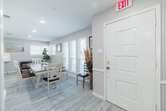 dining room featuring light hardwood / wood-style flooring