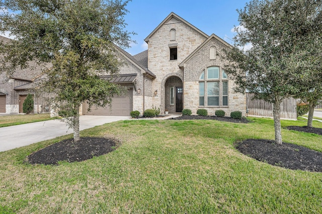 french country inspired facade featuring a garage and a front lawn