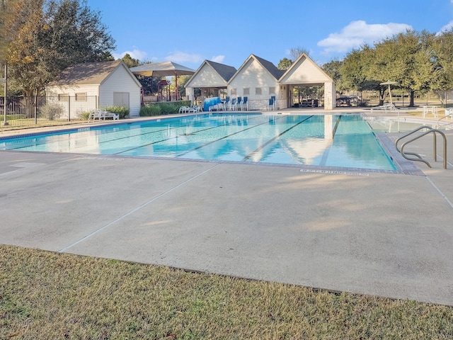 view of pool featuring a patio