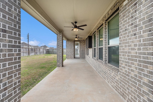 view of patio featuring ceiling fan