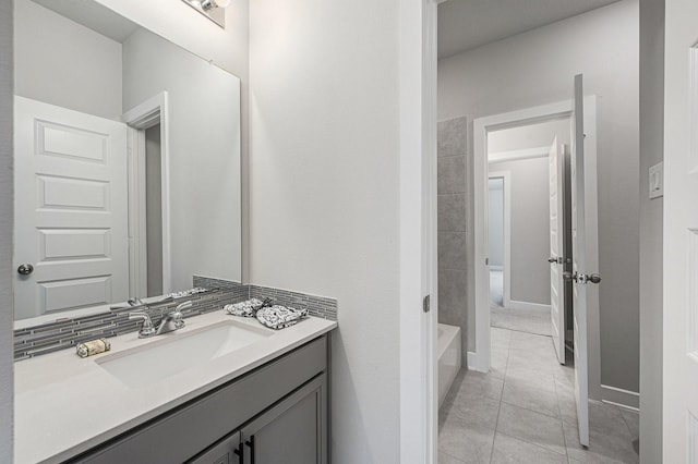 bathroom with tile patterned floors, shower / tub combination, and vanity