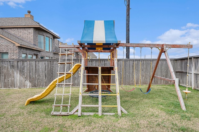 view of playground with a yard