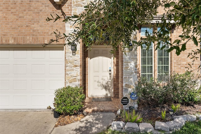 property entrance with a garage