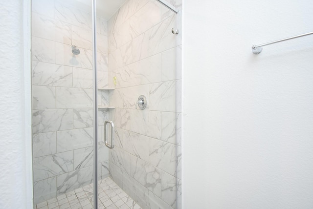 bathroom with an enclosed shower