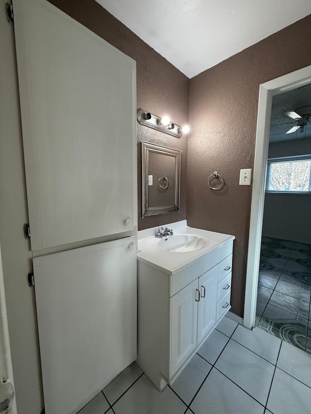 bathroom with vanity and tile patterned flooring