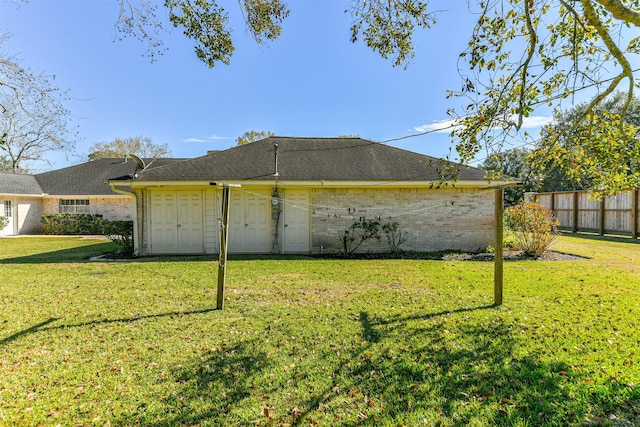 view of side of property featuring a yard