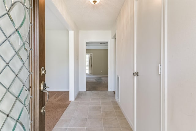 interior space featuring a textured ceiling