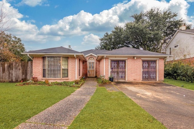 ranch-style house with a front yard