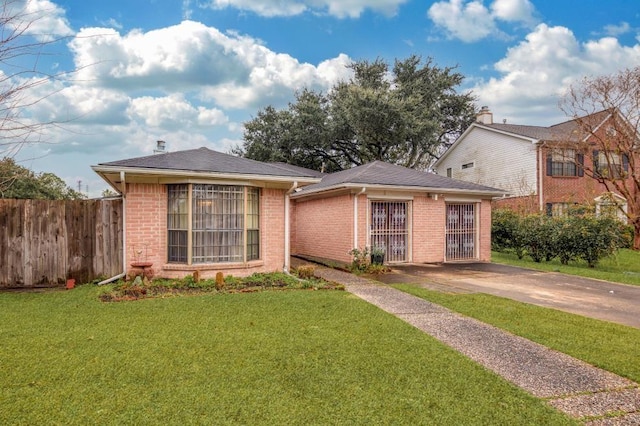 view of front facade with a front yard