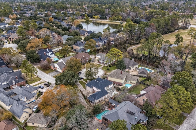 bird's eye view with a water view