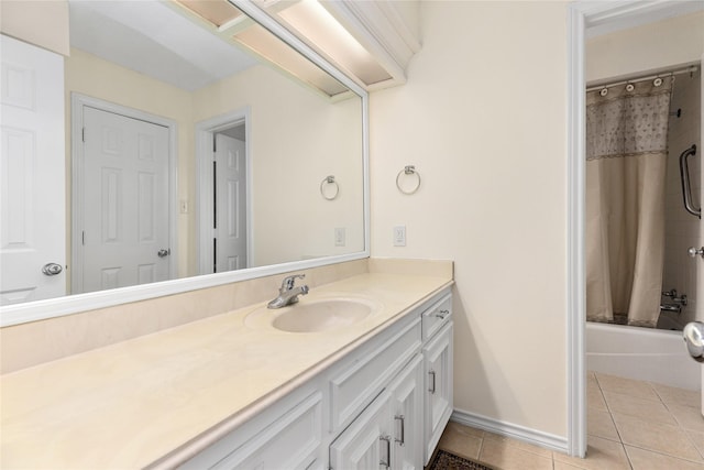 bathroom featuring vanity, tile patterned floors, and shower / tub combo