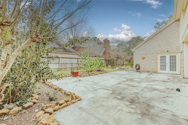 view of patio featuring french doors