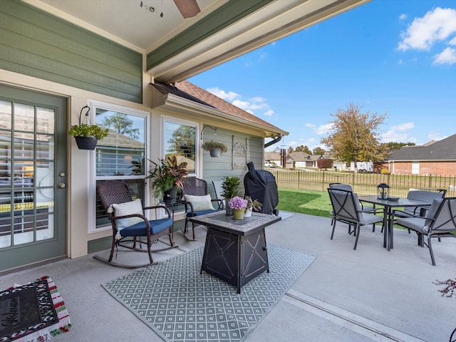 view of patio / terrace featuring ceiling fan and a grill